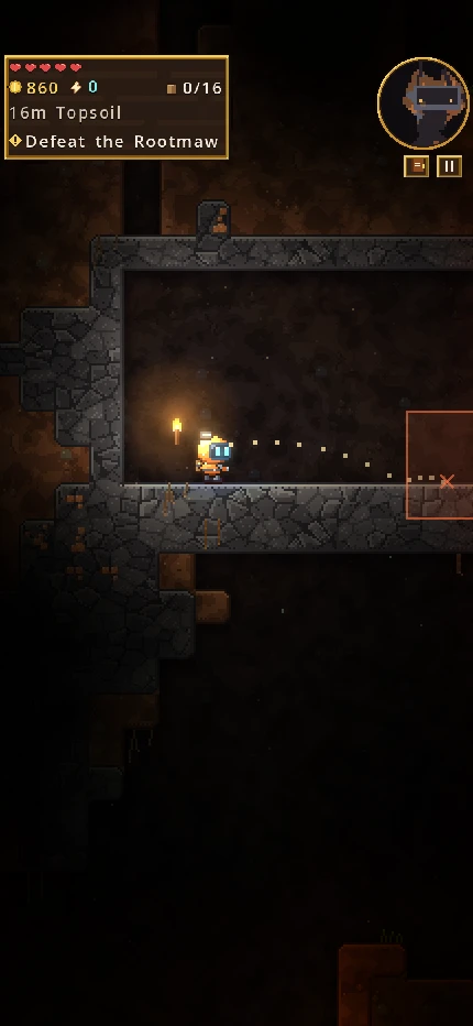 Aiming a dynamite throw across a torch-lit cave, the arc ending in a blast marker.